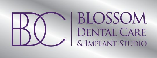 Blossom Dental Care and Implant Studio Logo